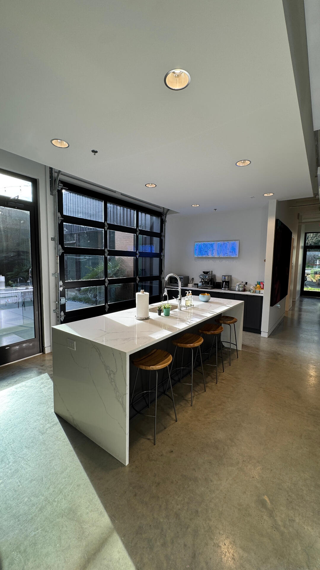 Kitchen and community patio at One Oh Four studio